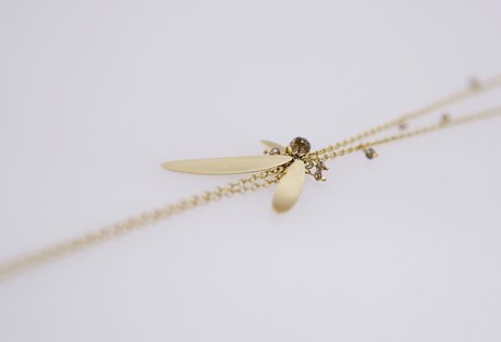 gold long drop diamond necklace